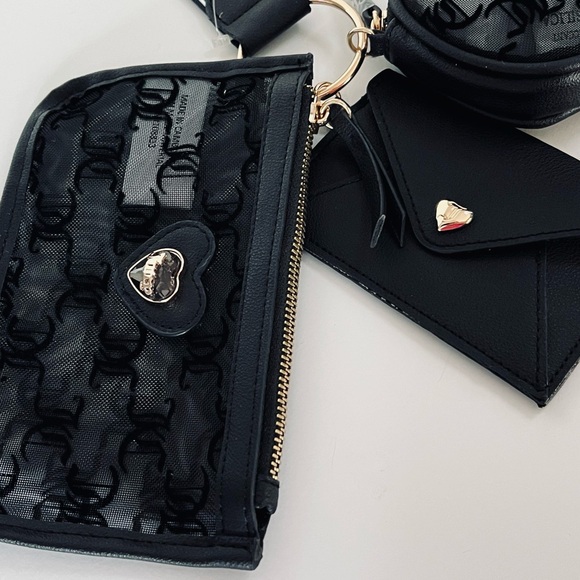 Juicy Couture Black Gelato On The Beach 3
Pouches & Wristlet Strap NWT - Picture 13 of 13